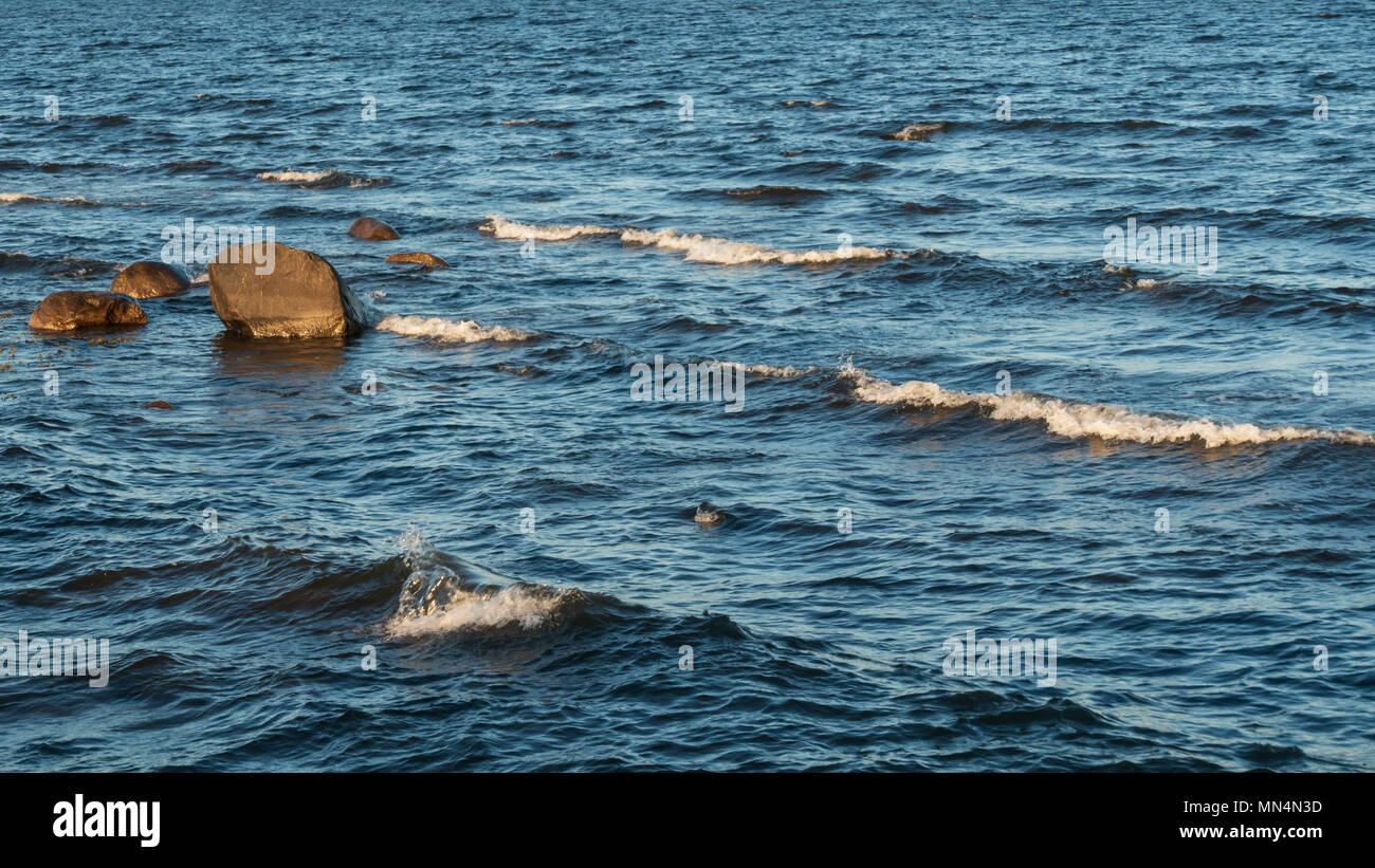Blue sea background with waves and foam Stock Photo - Alamy