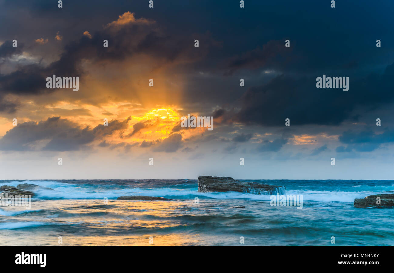 Capturing the sunrise from The Skillion at Terrigal on the Central Coast, NSW, Australia. Stock Photo