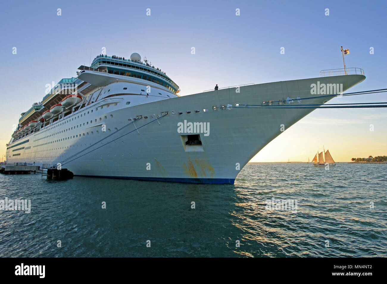 Big Cruise Ship And Small Sailing Boat Size Comparison Key West Florida Usa Stock Photo Alamy