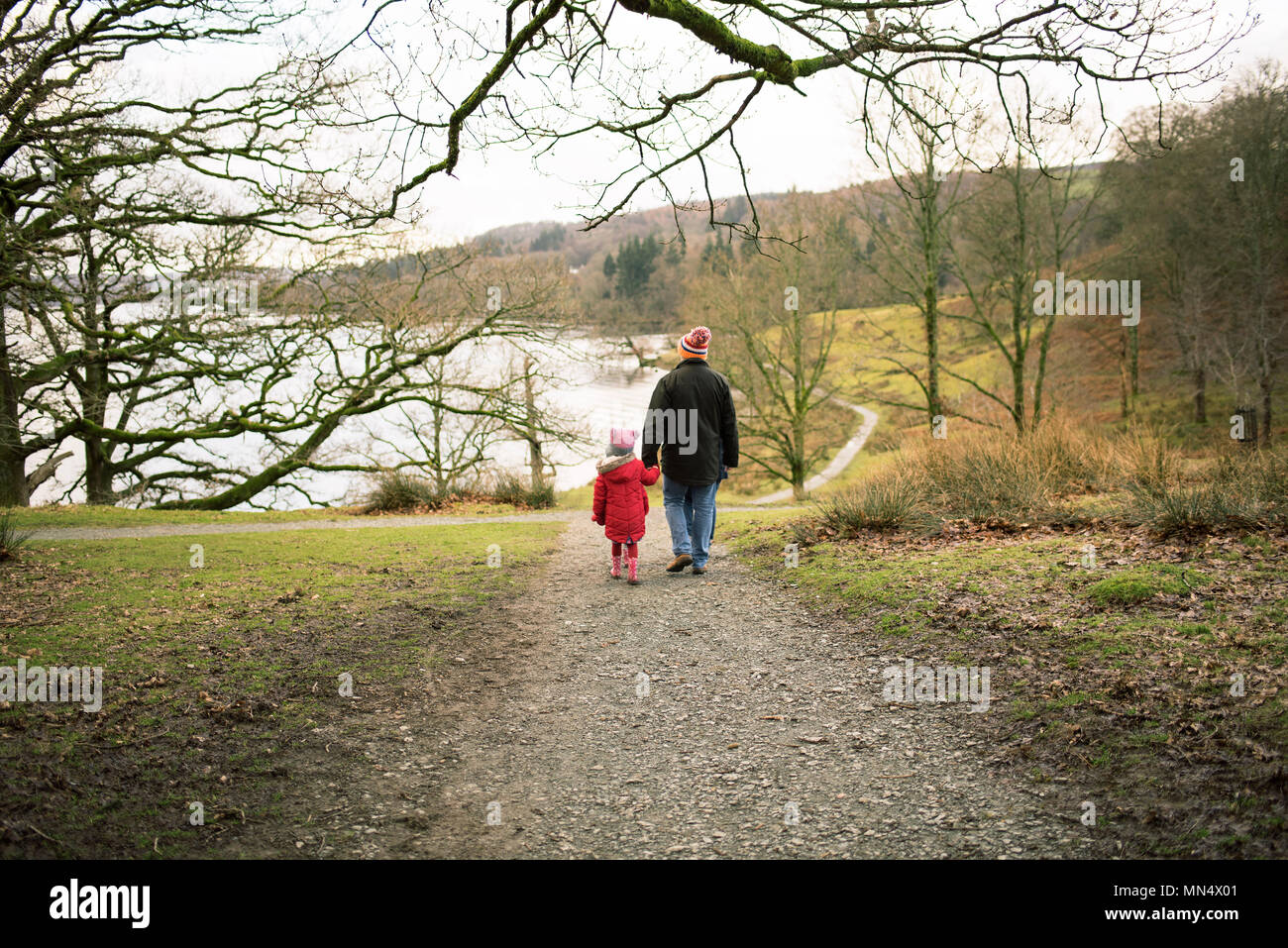 Family walking along the lakes, Ambleside, UK Stock Photo