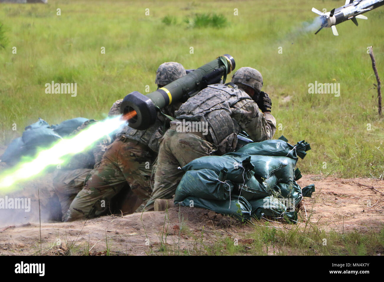 Soldiers with 3rd Battalion, 15th Infantry Regiment, 2nd Infantry Brigade Combat Team, 3rd Infantry Division, fire a Javelin weapons systems at Fort Stewart, Ga.,  Aug. 23, 2017. The Javelin weapons system is a medium anti-tank, portable missile launcher that uses a tandem-shaped charge penetrator to defeat armored threats. Stock Photo