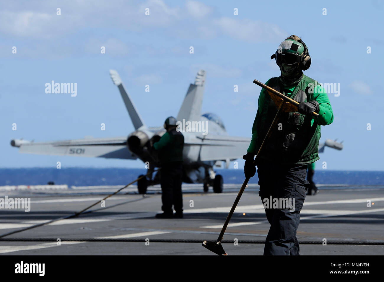 171020-N-PE636-019 ATLANTIC OCEAN (Oct. 20, 2017) Aviation Boatswain's Mate (Equipment) Airman Brandon Chapman participates in flight operations on the flight deck aboard USS Harry S. Truman (CVN 75). Truman is currently underway conducting Tailored Shipboard Test Availability and Final Evaluation Problem (TSTA/FEP) in preparation for future operations. (U.S. Navy photo by Mass Communication Specialist 2nd Class Anthony Flynn/Released) Stock Photo
