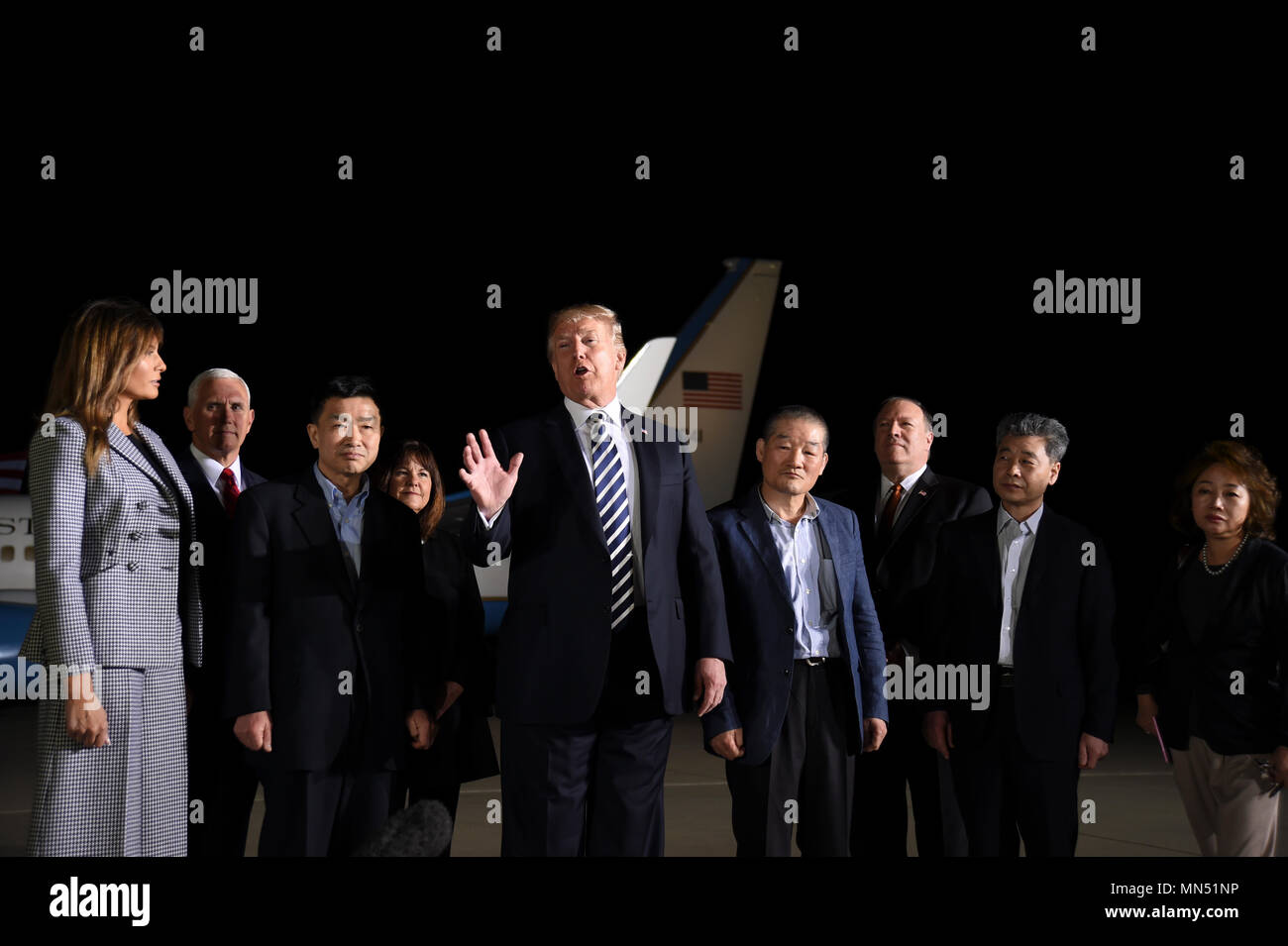 President of the United States Donald J. Trump speaks to the press at Joint Base Andrews, Md., May 10, 2018 upon the return of three Americans who were freed from North Korean prison on May 9, 2018. Kim Dong-chul, Tony Kim and Kim Hak-song arrived at JBA on board an 89th Airlift Wing C-40 high-priority personnel transport aircraft at 3 a.m. EST. President Trump, First Lady Melania Trump and senior military officials greeted the men as they arrived home. (U.S. Air Force photo/Staff Sgt. Kenny Holston) Stock Photo