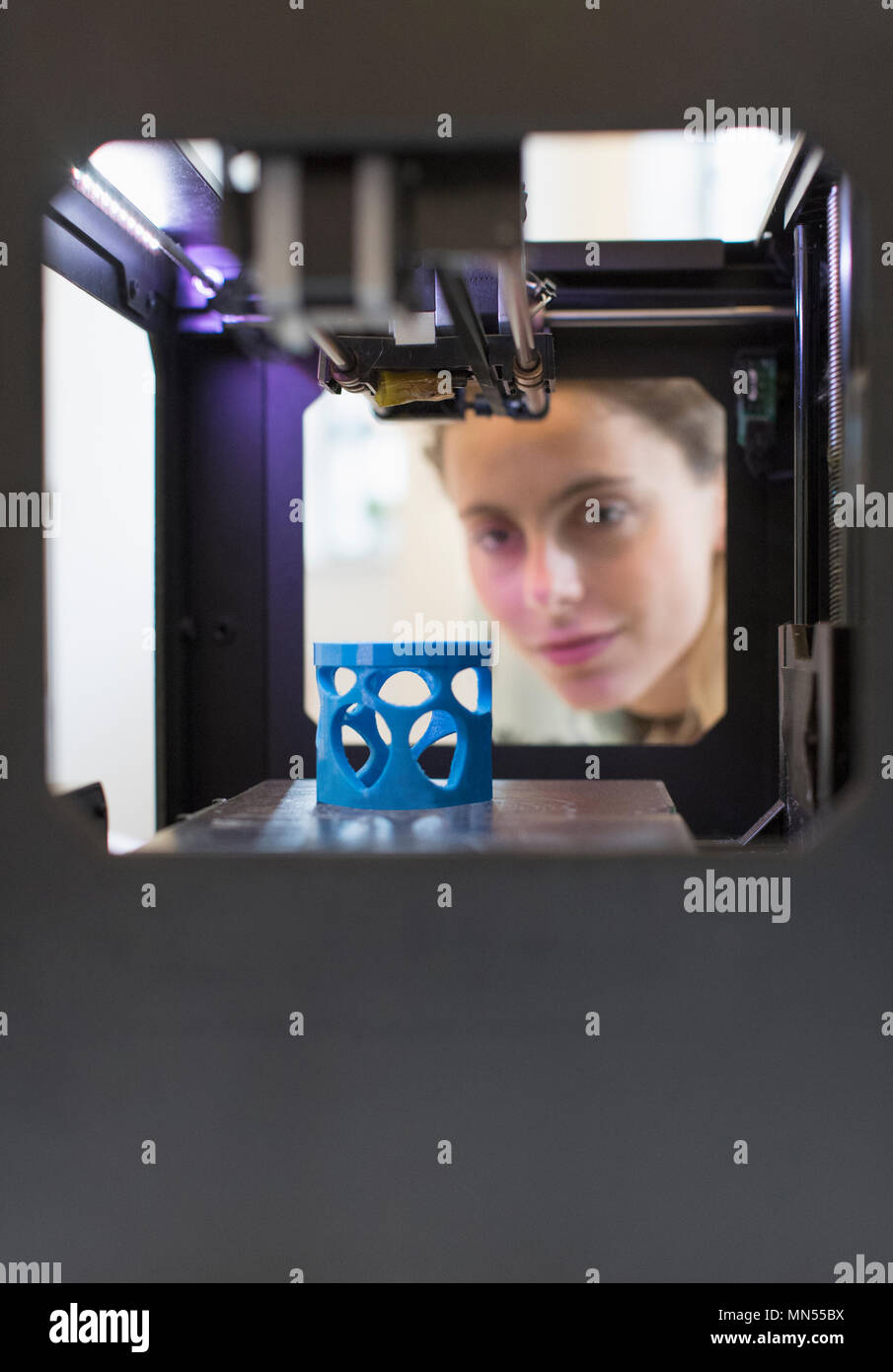 Female designer using 3D printer Stock Photo