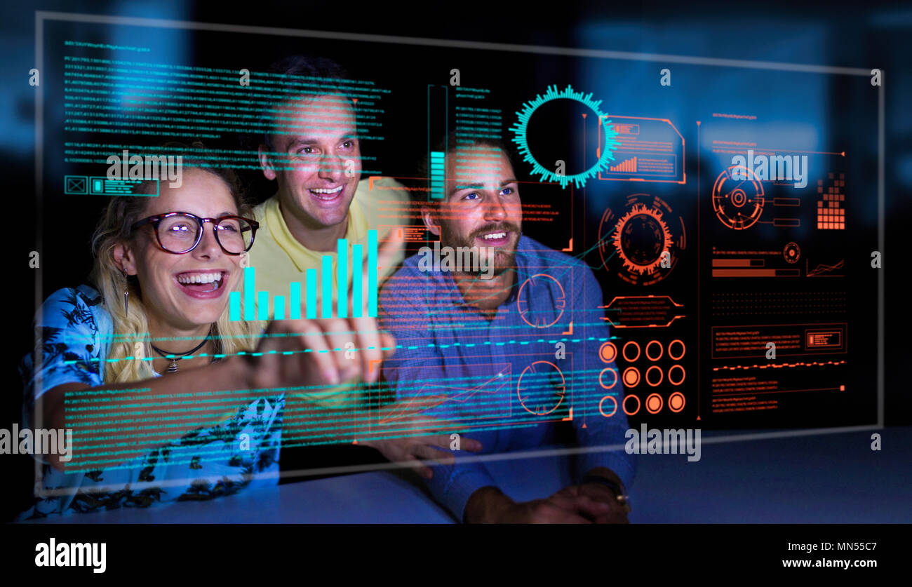 Enthusiastic business people using futuristic hologram computer Stock Photo