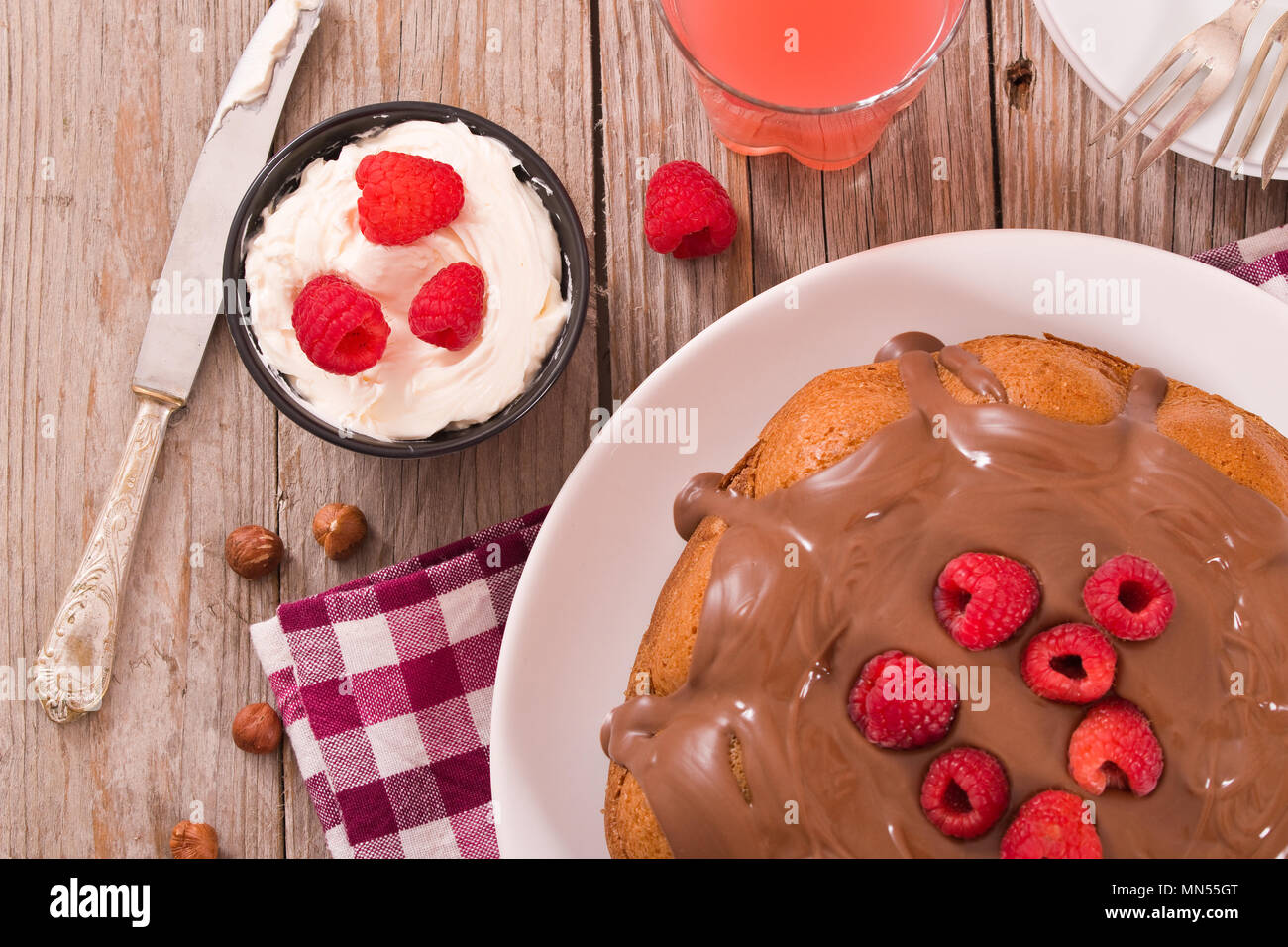 Chocolate cake with raspberries Stock Photo - Alamy