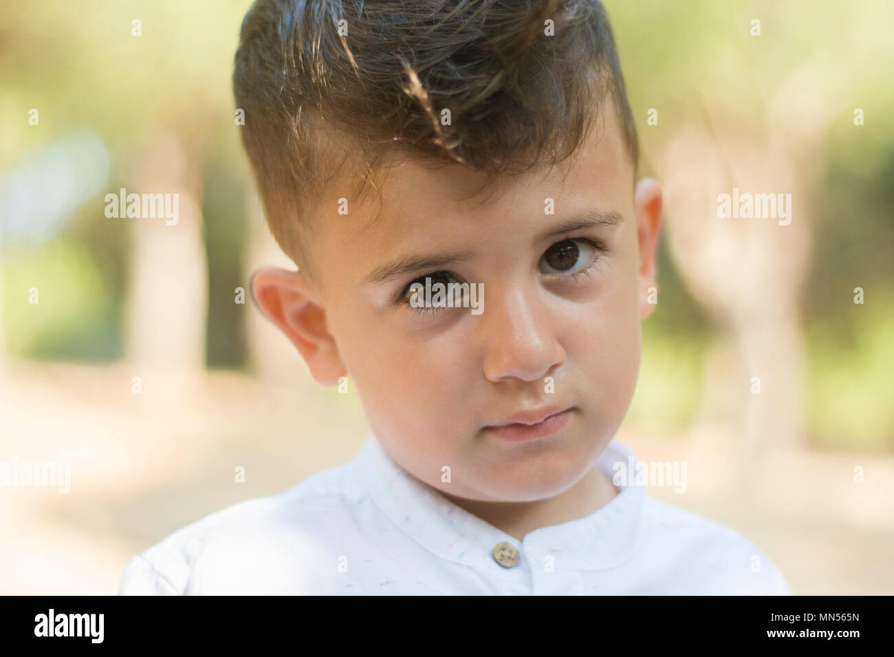 Close up portrait of a cute little boy Stock Photo - Alamy