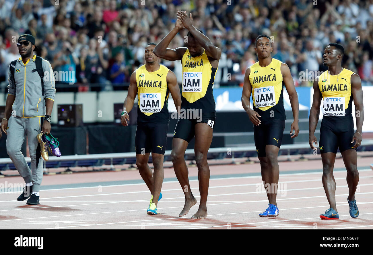 LONDON, ENGLAND - AUGUST 12: Usain Bolt of Jamaica leaving with team mates Tyquendo Tracey, Julian Forte and Michael Campbell after falling in the Men's 4x100 Relay final during day nine of the 16th IAAF World Athletics Championships London 2017 at The London Stadium on August 12, 2017 in London, United Kingdom --- Image by © Paul Cunningham Stock Photo