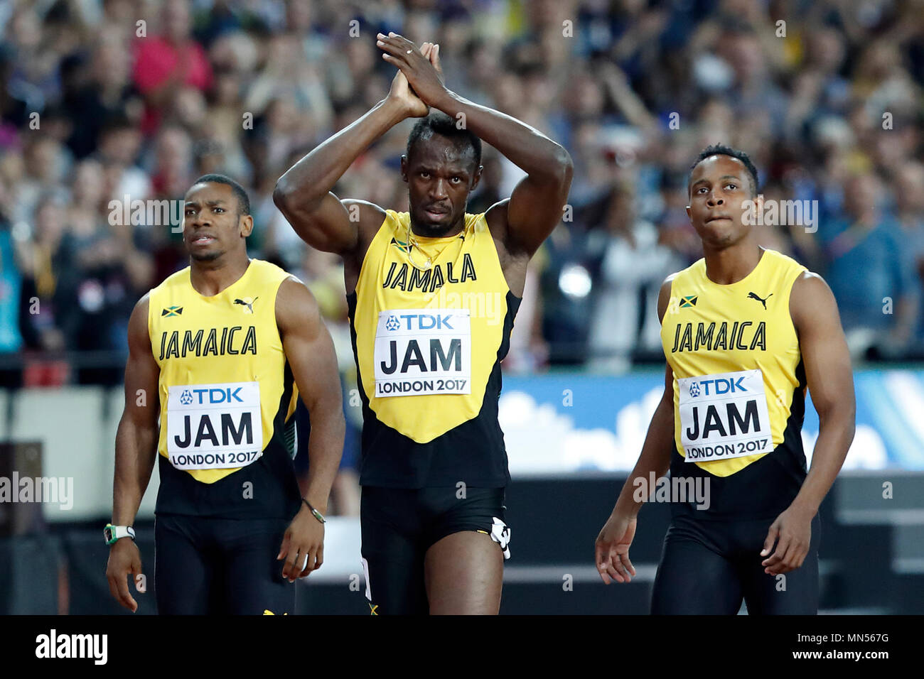 LONDON, ENGLAND - AUGUST 12: Usain Bolt of Jamaica leaving with team mates Tyquendo Tracey, Julian Forte and Michael Campbell after falling in the Men's 4x100 Relay final during day nine of the 16th IAAF World Athletics Championships London 2017 at The London Stadium on August 12, 2017 in London, United Kingdom --- Image by © Paul Cunningham Stock Photo