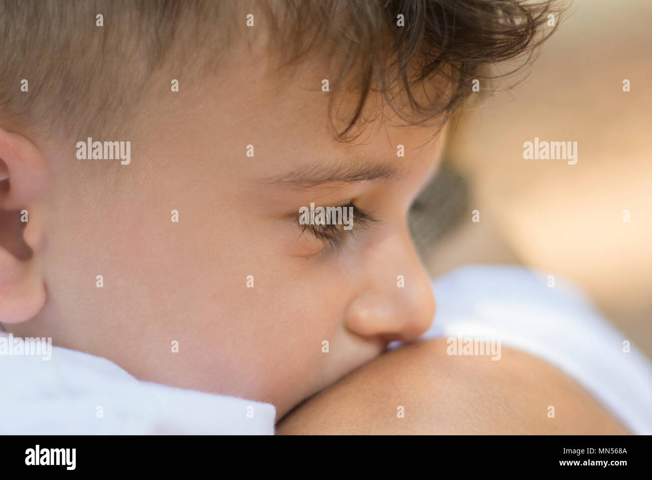 Close up of a little boy with his mother Stock Photo