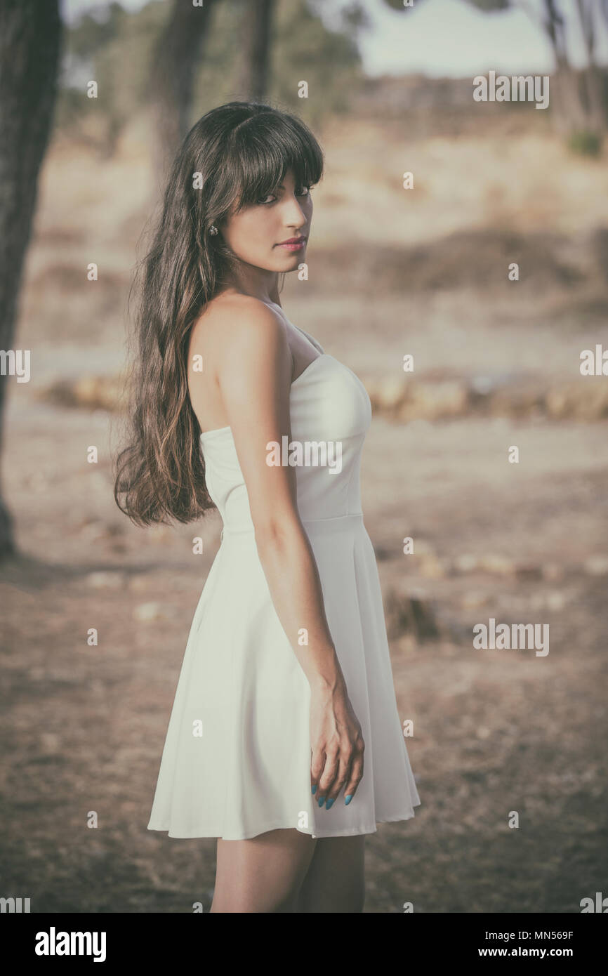Woman standing dress outside profile hi-res stock photography and ...