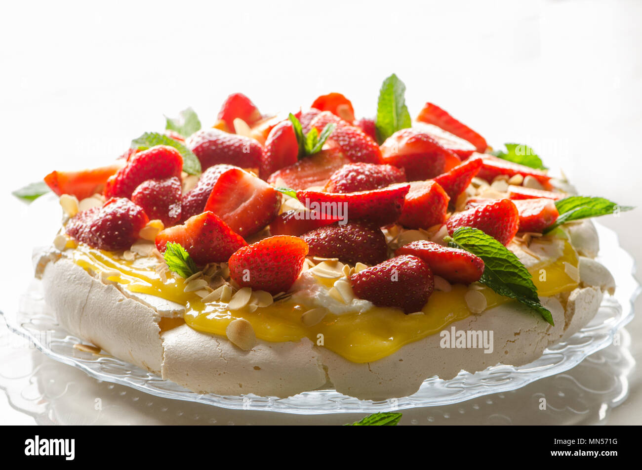 Strawberry pavlova. Meringue and cream dessert Stock Photo Alamy
