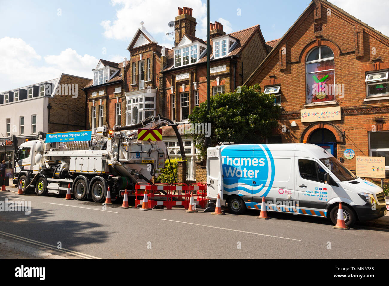 Thames water lorry van vans vehicles at the site of a