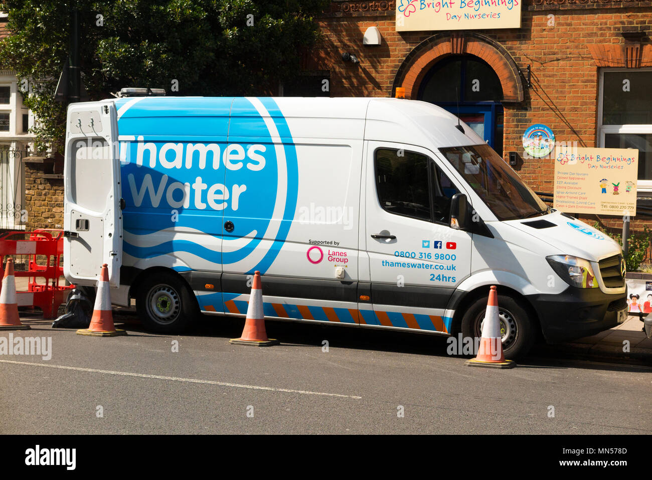 Thames water lorry / van / vans / vehicles at the site of a blocked pipe /  drain / drainage / sewer blockage attended by their staff and workers in  Twickenham, West London. UK (96 Stock Photo - Alamy