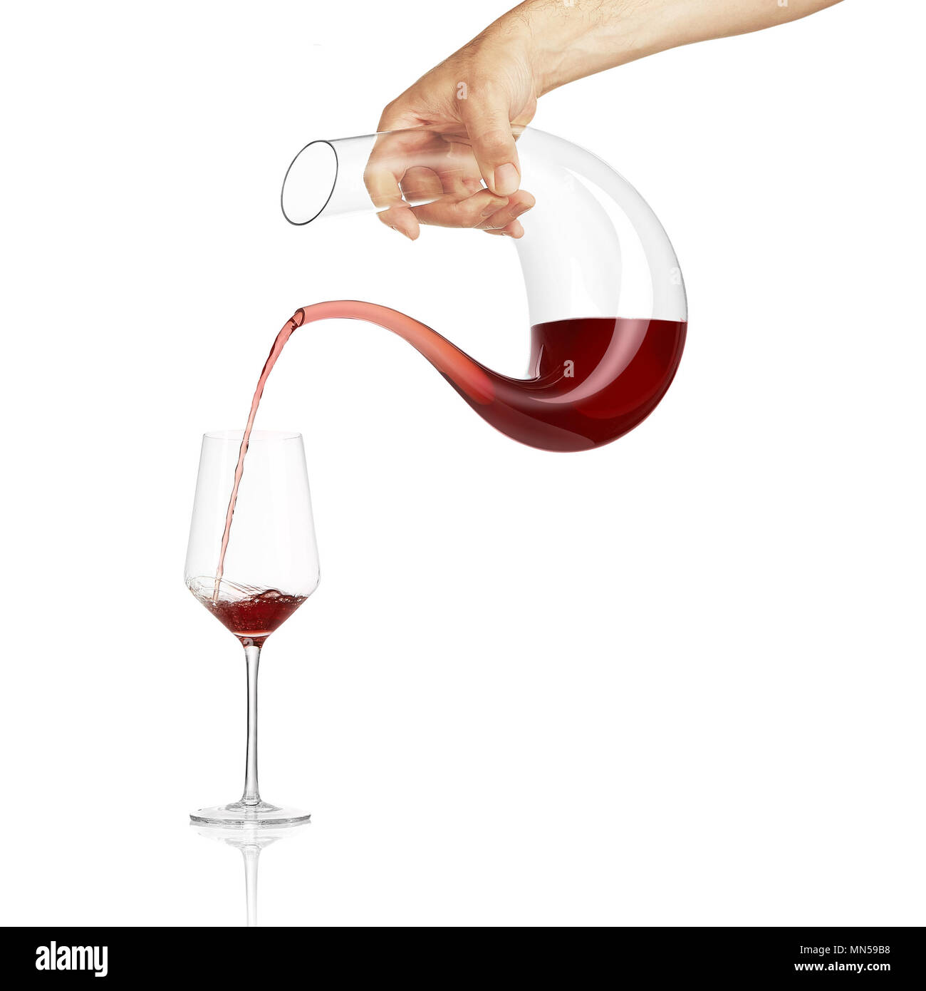 Crystal glass decanter pouring wine Stock Photo