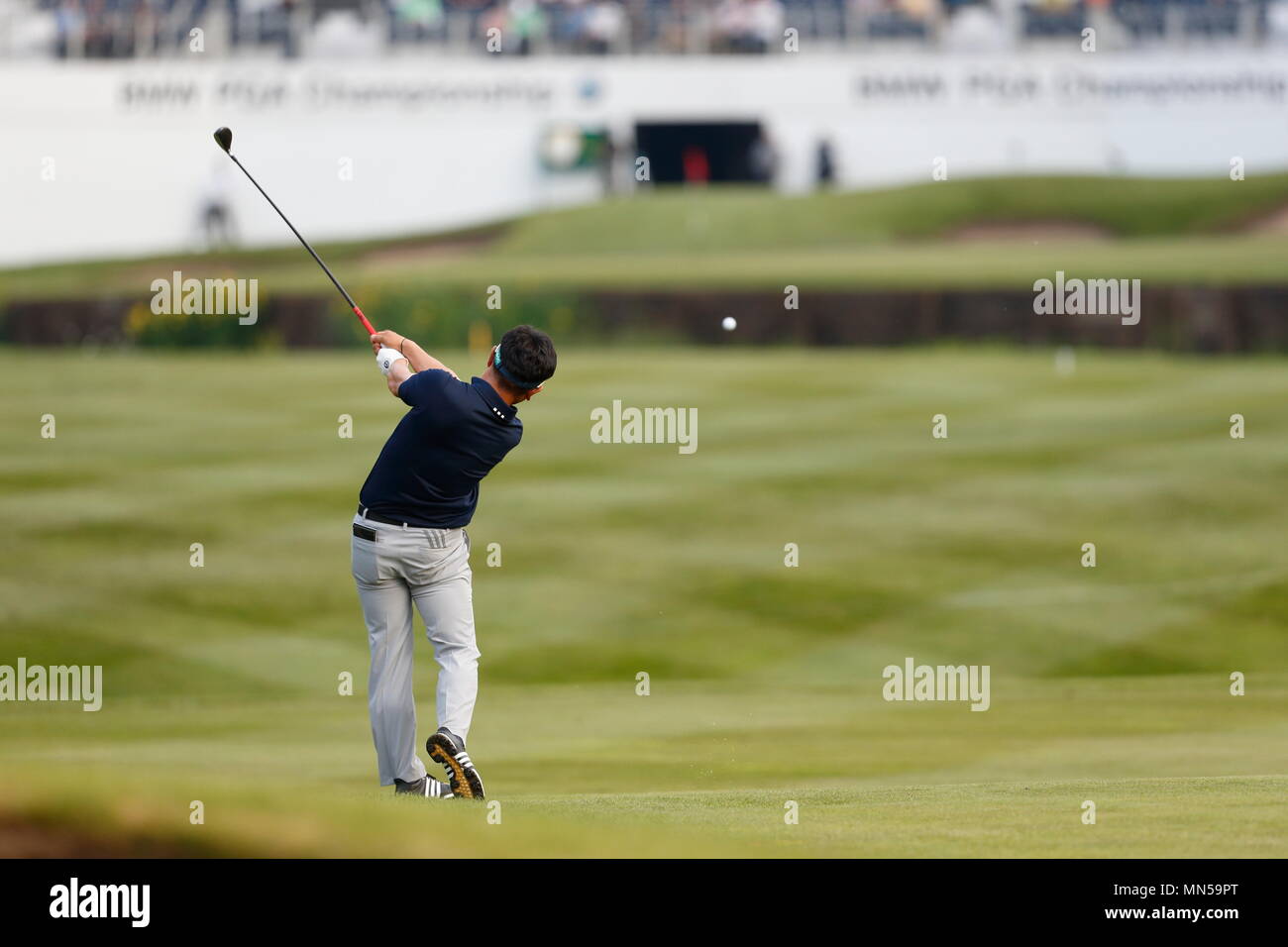 VIRGINIA WATER, ENGLAND - MAY 27: Y.E Yang approach shot from the 18th fairway, he finishes -10 under par during day two of the BMW PGA Championship at Wentworth on May 27, 2016 in Virginia Water, England. Stock Photo