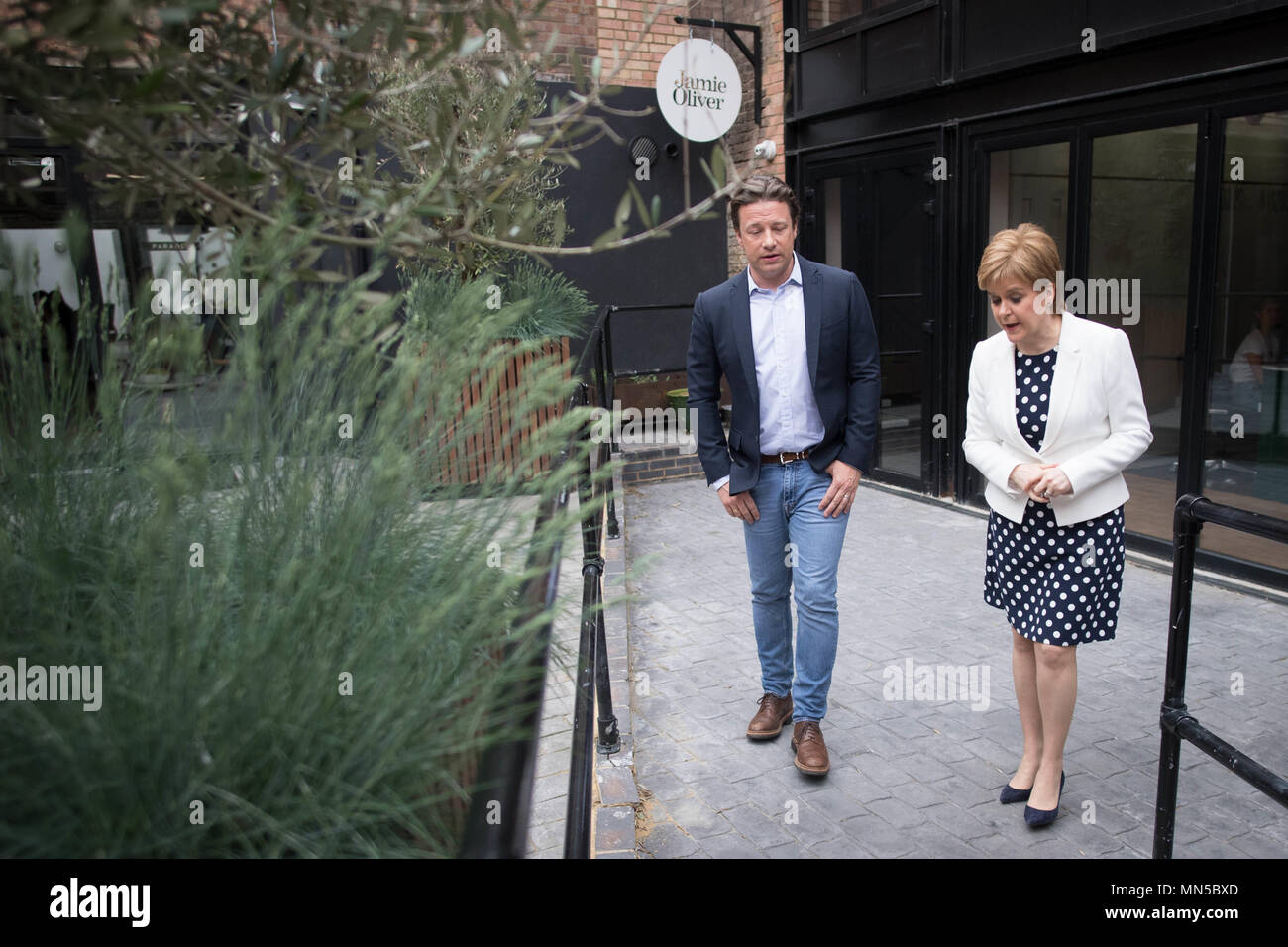 Jamie Oliver meeting First Minister Nicola Sturgeon at Benwell House in London where she announced new childhood obesity initiatives. Stock Photo