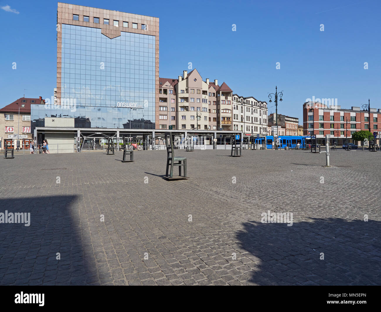 Krakow Ghetto Heroes Square or Plac Bohaterow with giant chair sculptures in memorial to the Jewish Ghetto Poland Stock Photo