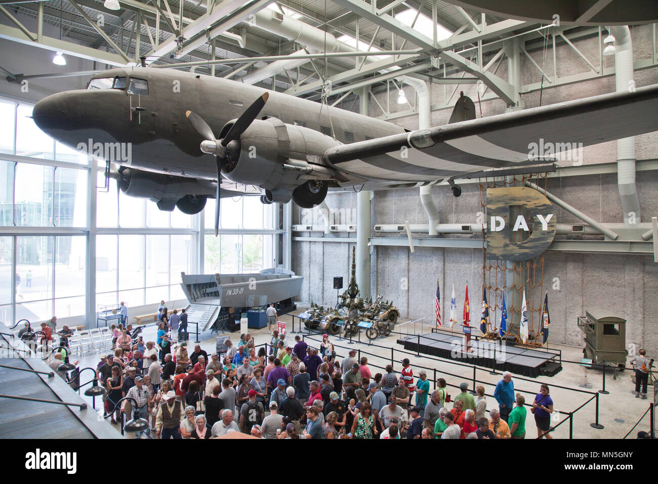 Louisiana Memorial Museum Atrium is the entry area for the The National World War II Museum, New Orleans, Louoisiana. Floor displays include the Higg Stock Photo