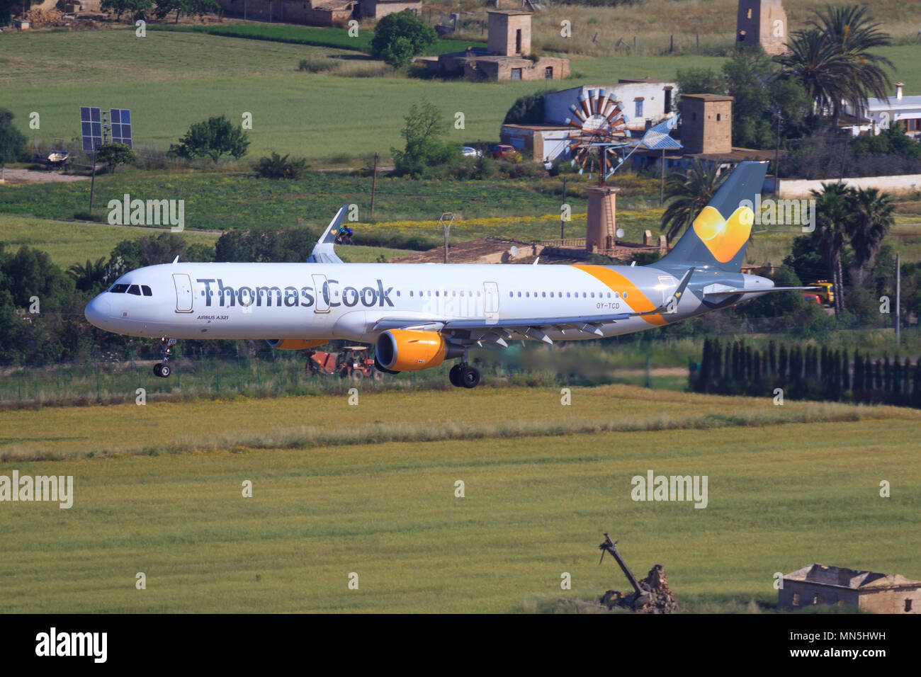 Airbus a321 from Thomas Cook landing on the beautiful island in Spain Stock Photo