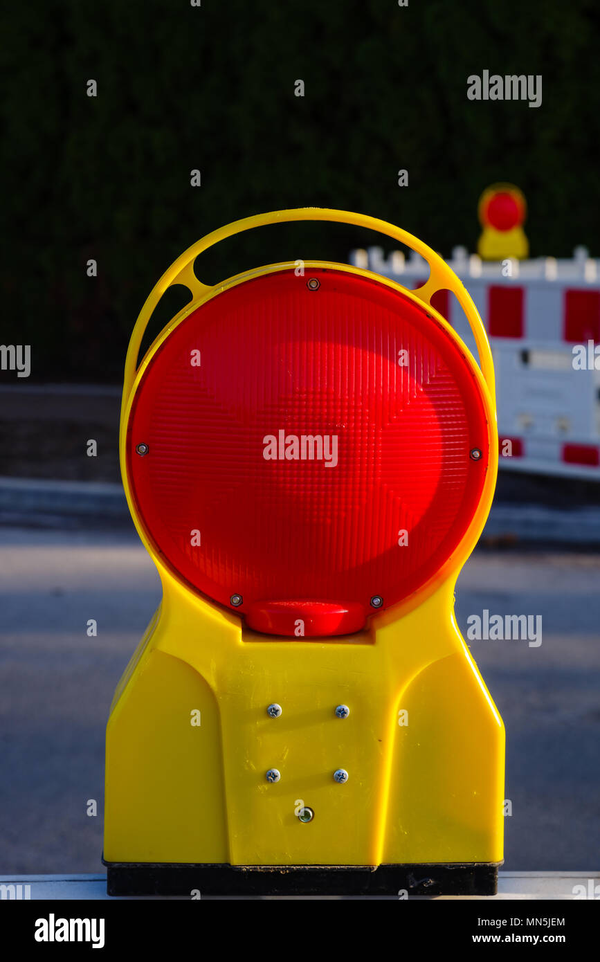Red warning light for construction site hires stock photography and