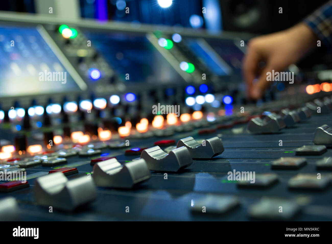 Hand on a Mixing Desk Fader in Television Gallery Stock Photo Alamy