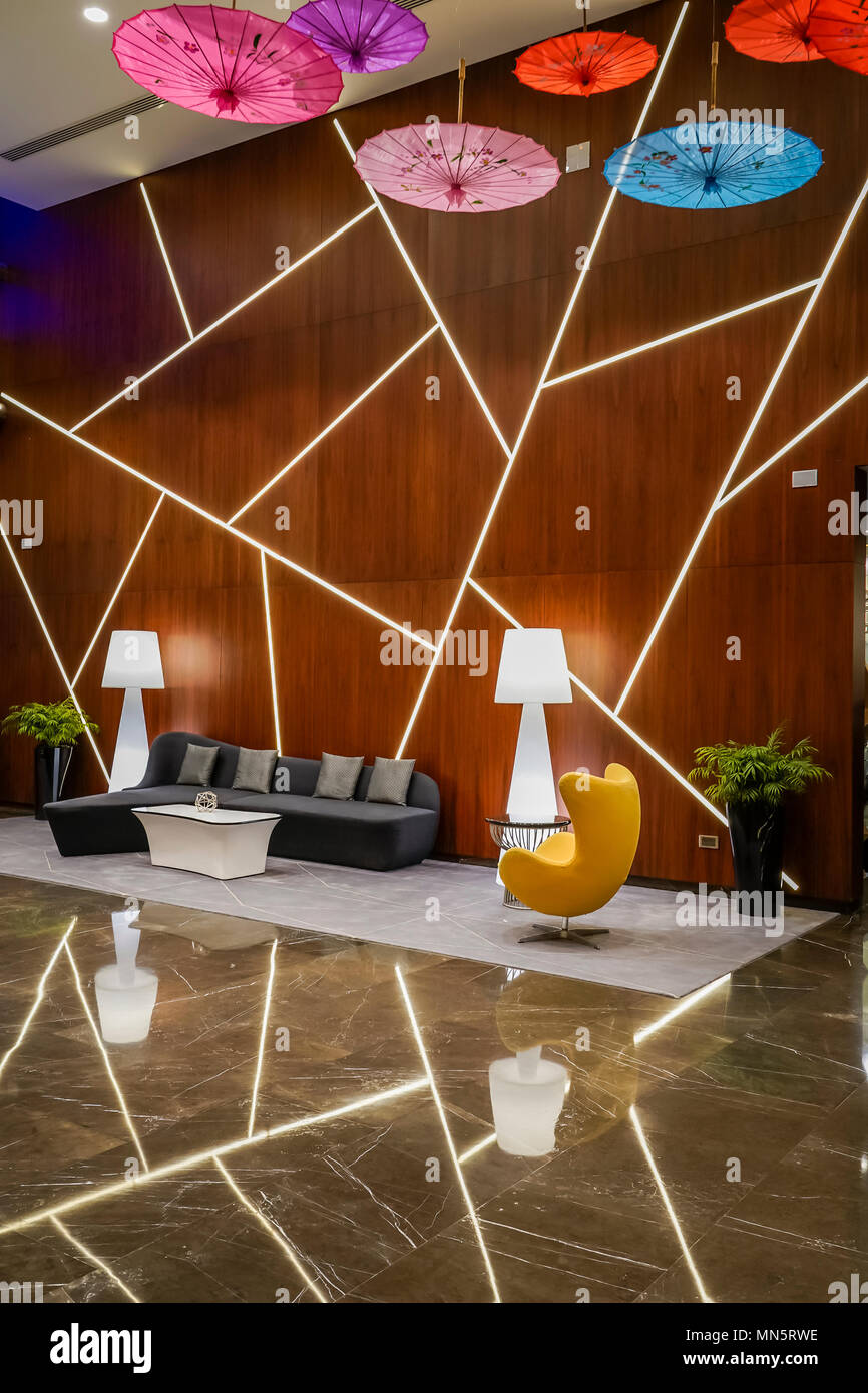 The interior hotel lobby decor of the TRYP by Wyndam Hotel in Barsha Heights, Dubai, UAE, Middle East. Stock Photo