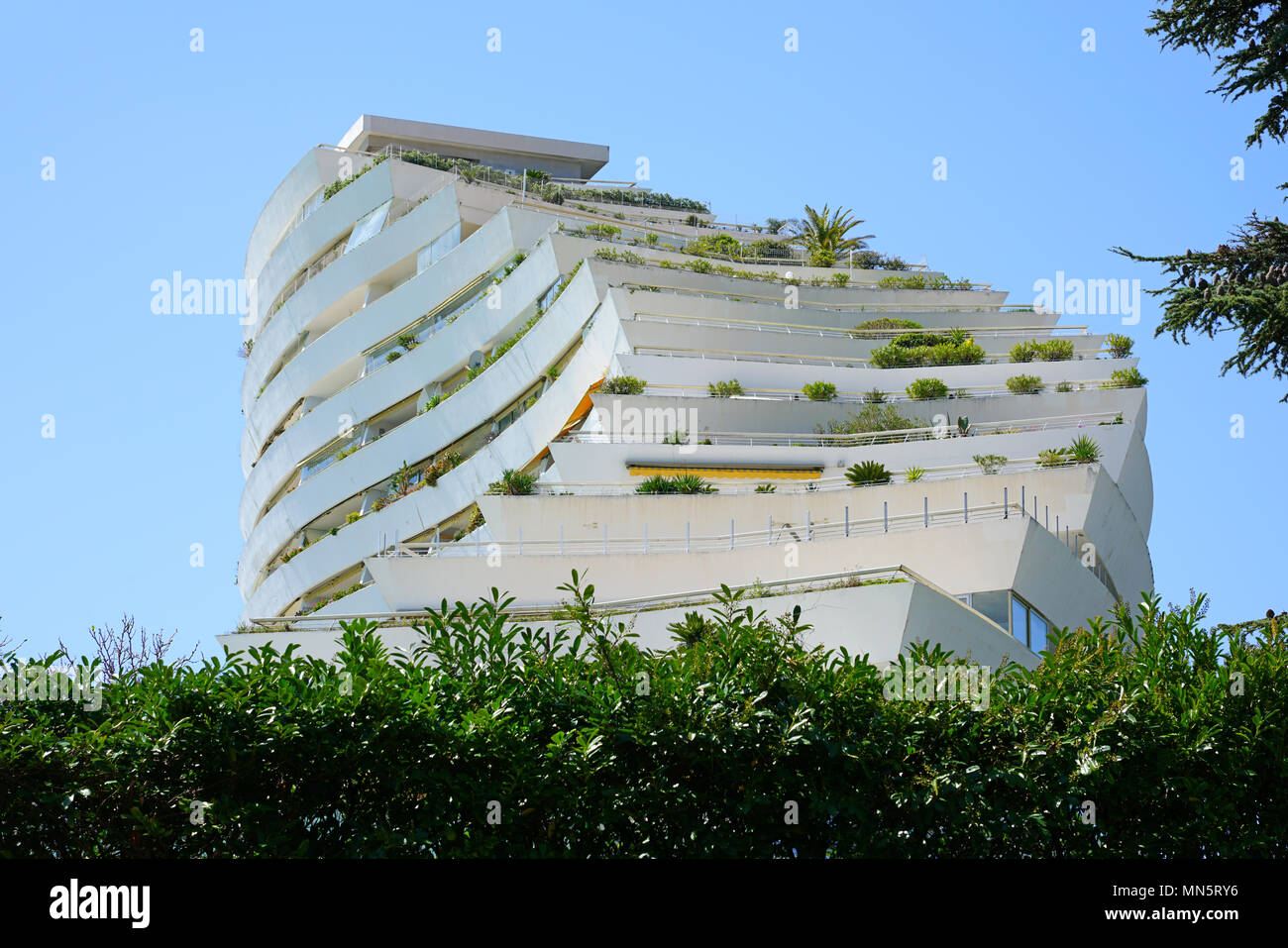 View of the Marina Baie des Anges building complex built by architect Andre Minangoy on the French Riviera. Stock Photo