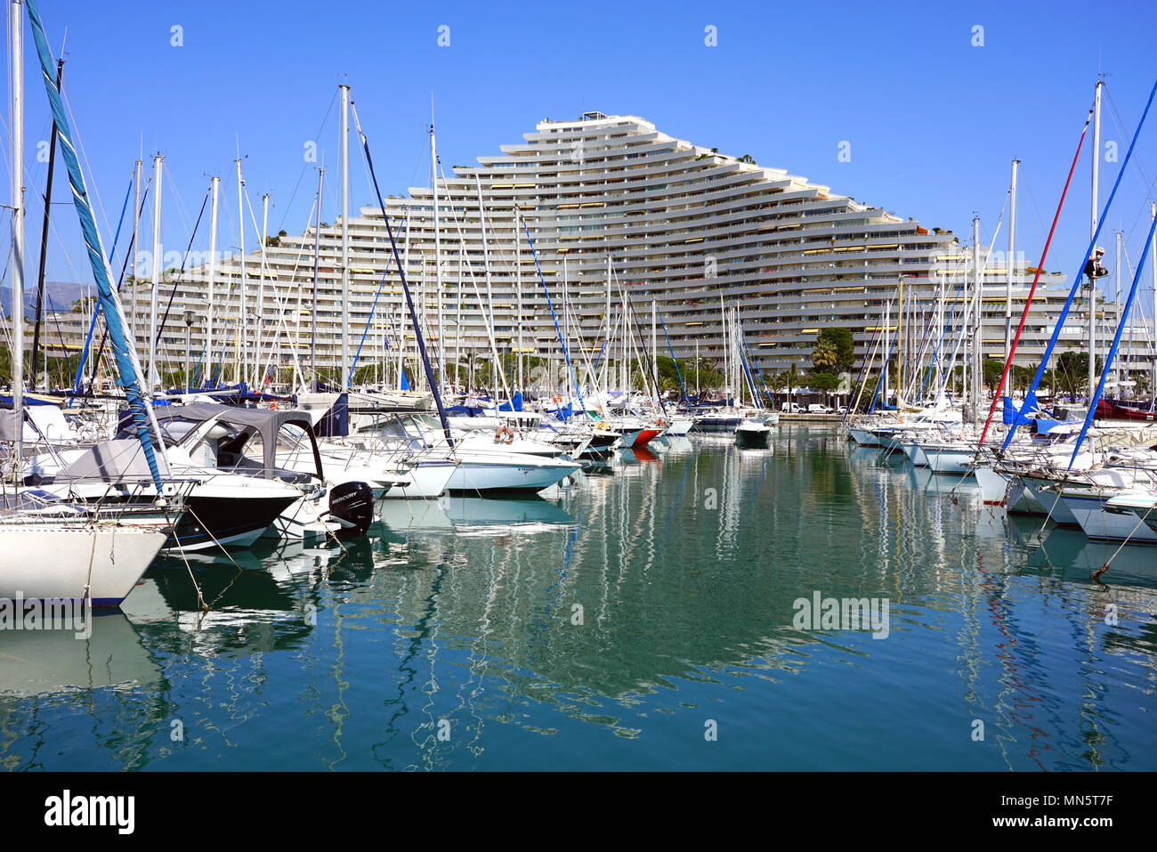 View of the Marina Baie des Anges building complex built by architect Andre Minangoy on the French Riviera. Stock Photo