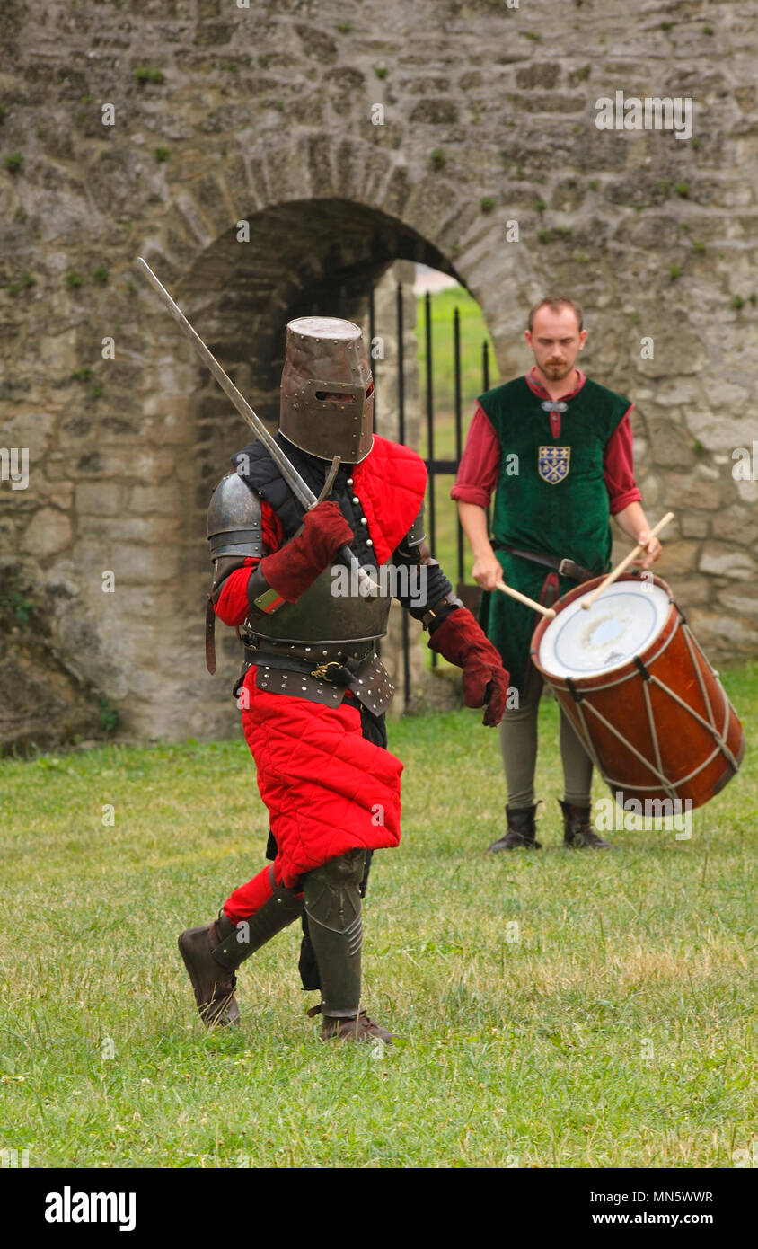 Infantry warrior. Show by members of The Knightly Order of St. George of Visegrad (Hungary). 'Knight's Tournament with Plum'. Szydlow, Poland. Stock Photo