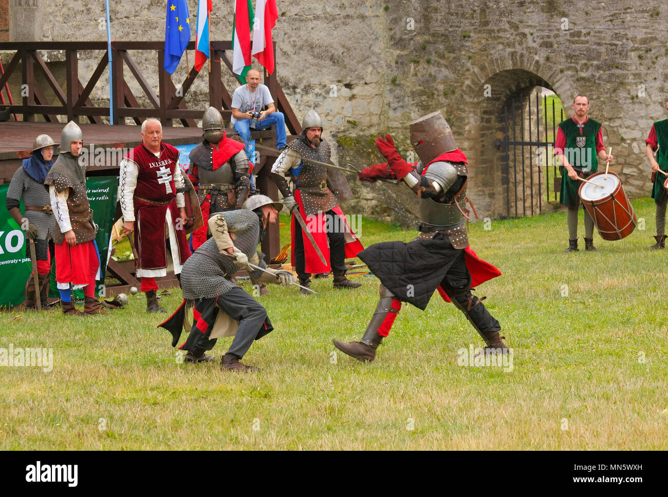 Infantry warriors combat show by members of The Knightly Order of St. George of Visegrad (Hungary). 'Knight's Tournament with Plum'. Szydlow, Poland. Stock Photo
