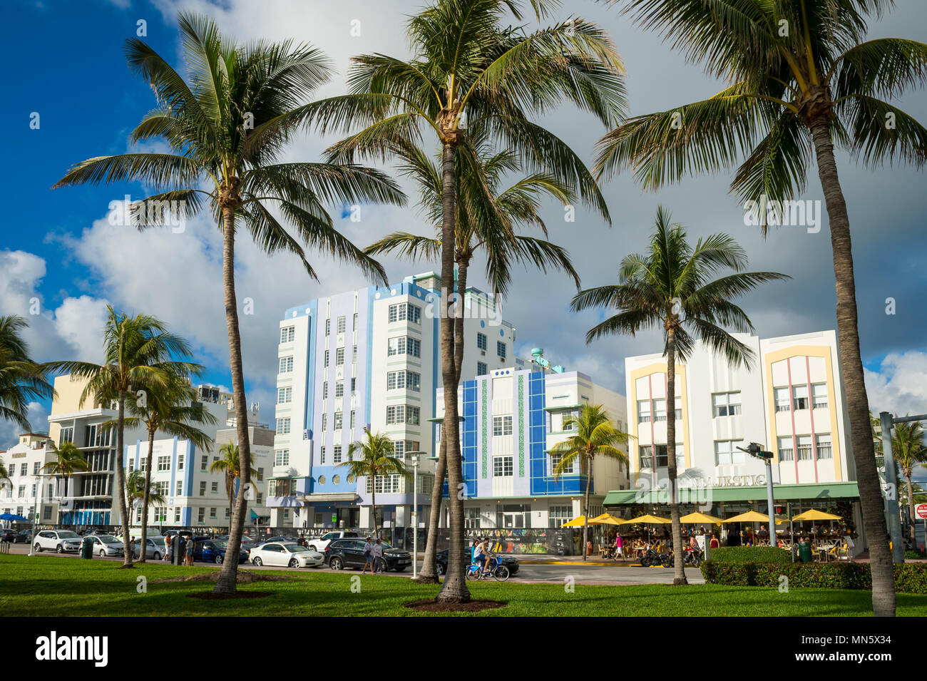 MIAMI - CIRCA JANUARY, 2018: Restaurants on the tourist strip of Ocean Drive stand ready for morning customers in South Beach. Stock Photo