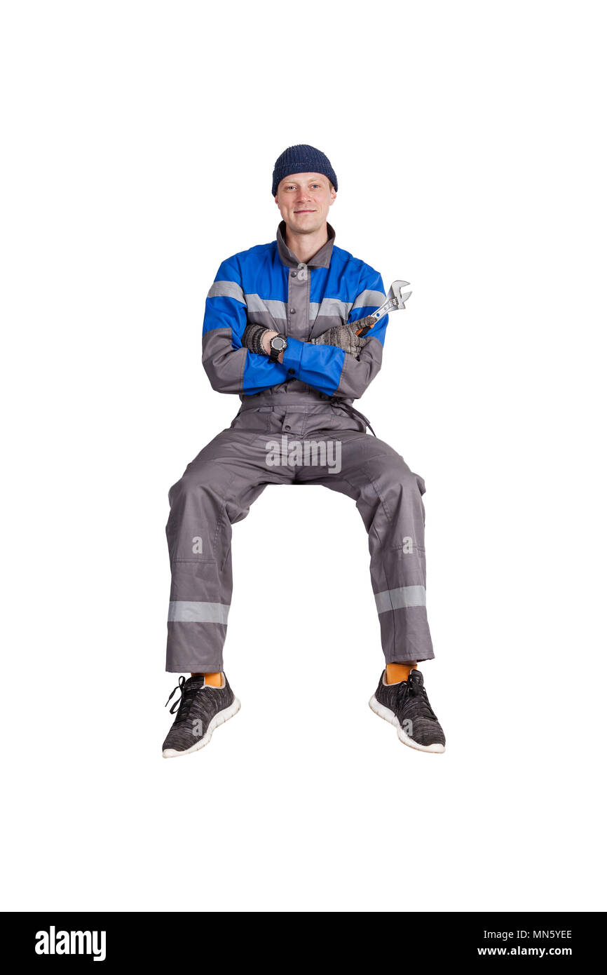 Builder, installer of ventilation with tools in hands. Stock Photo