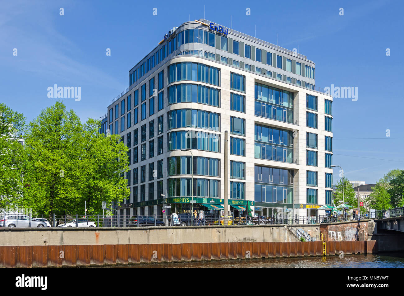 Berlin, Germany - April 22, 2018: River Spree and its bank Schiffbauerdamm, modern representative building of the EnBW Stock Photo