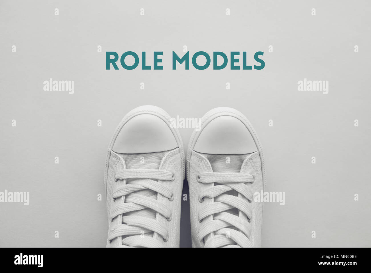 Role model for young people conceptual image with youth lifestyle type sneakers from above Stock Photo