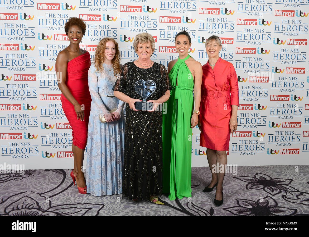 Betty McIntyre (centre) wins the Hero Nurse Award at the NHS Heroes Awards, presented by (left to right) Denise Lewis, Victoria Yeates, Myleene Klass and Jenny Agutter, at the Hilton Hotel in London. Stock Photo