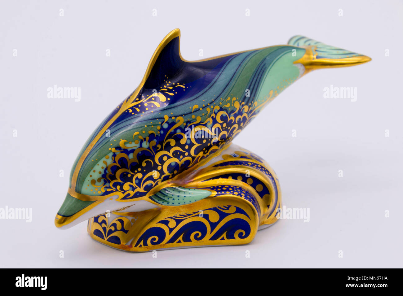 Royal Crown Derby bone china paperweightof a dolphin uk Stock Photo