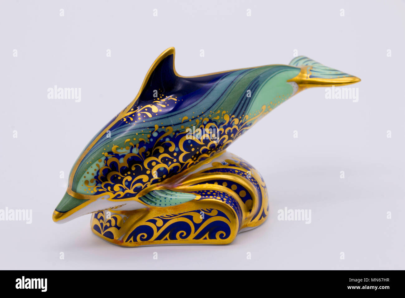Royal Crown Derby bone china paperweightof a dolphin uk Stock Photo
