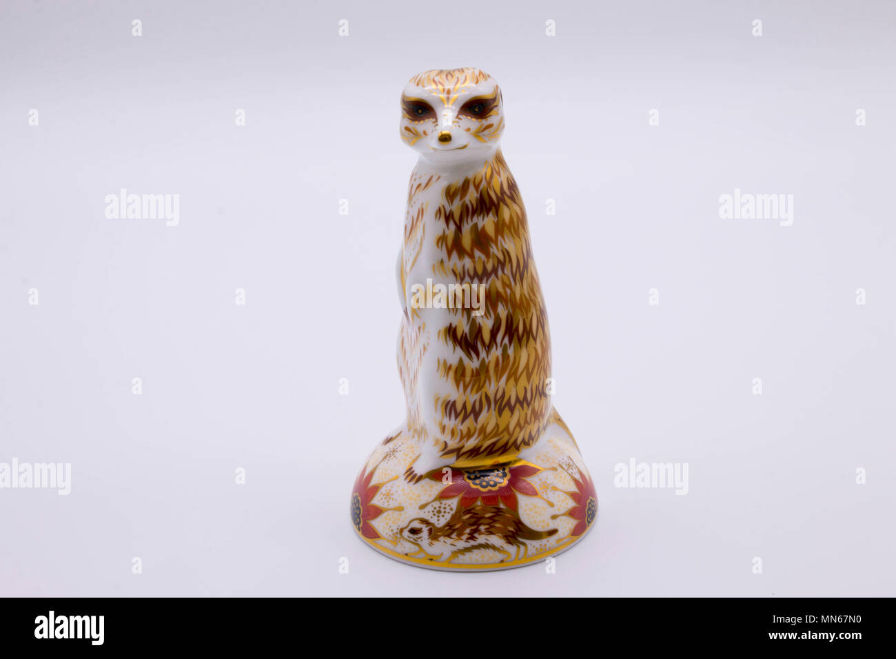 Royal Crown Derby bone china paperweight of a meerkat uk Stock Photo
