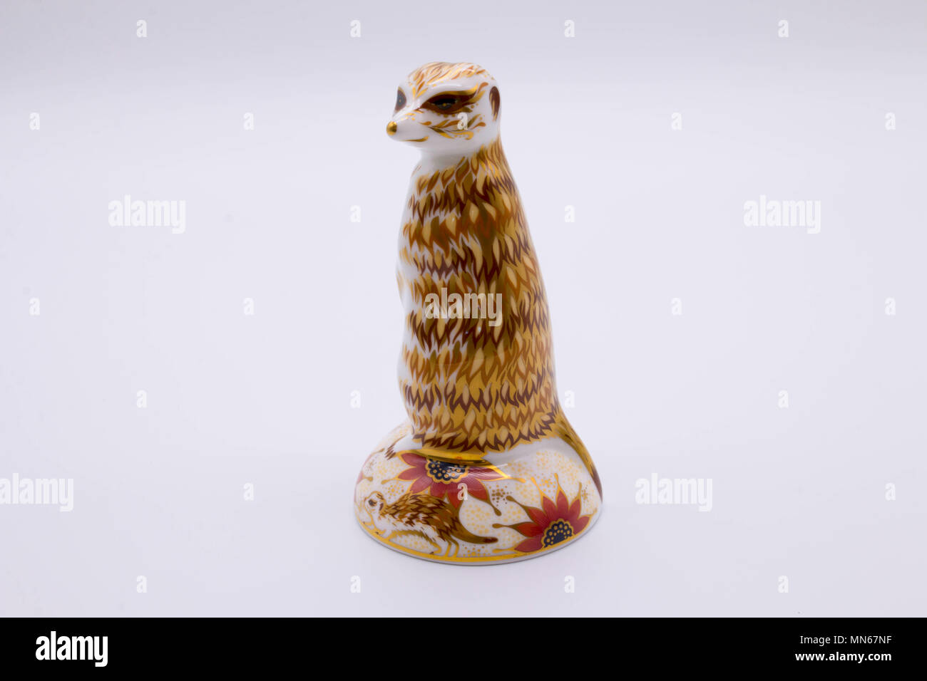 Royal Crown Derby bone china paperweight of a meerkat uk Stock Photo