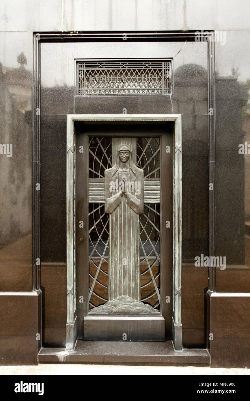 Recoleta Cemetery, Buenos Aires, capital of Argentina.  Tomb entrance with design showing the Virgin Mary. Art Deco. Modern. Stock Photo