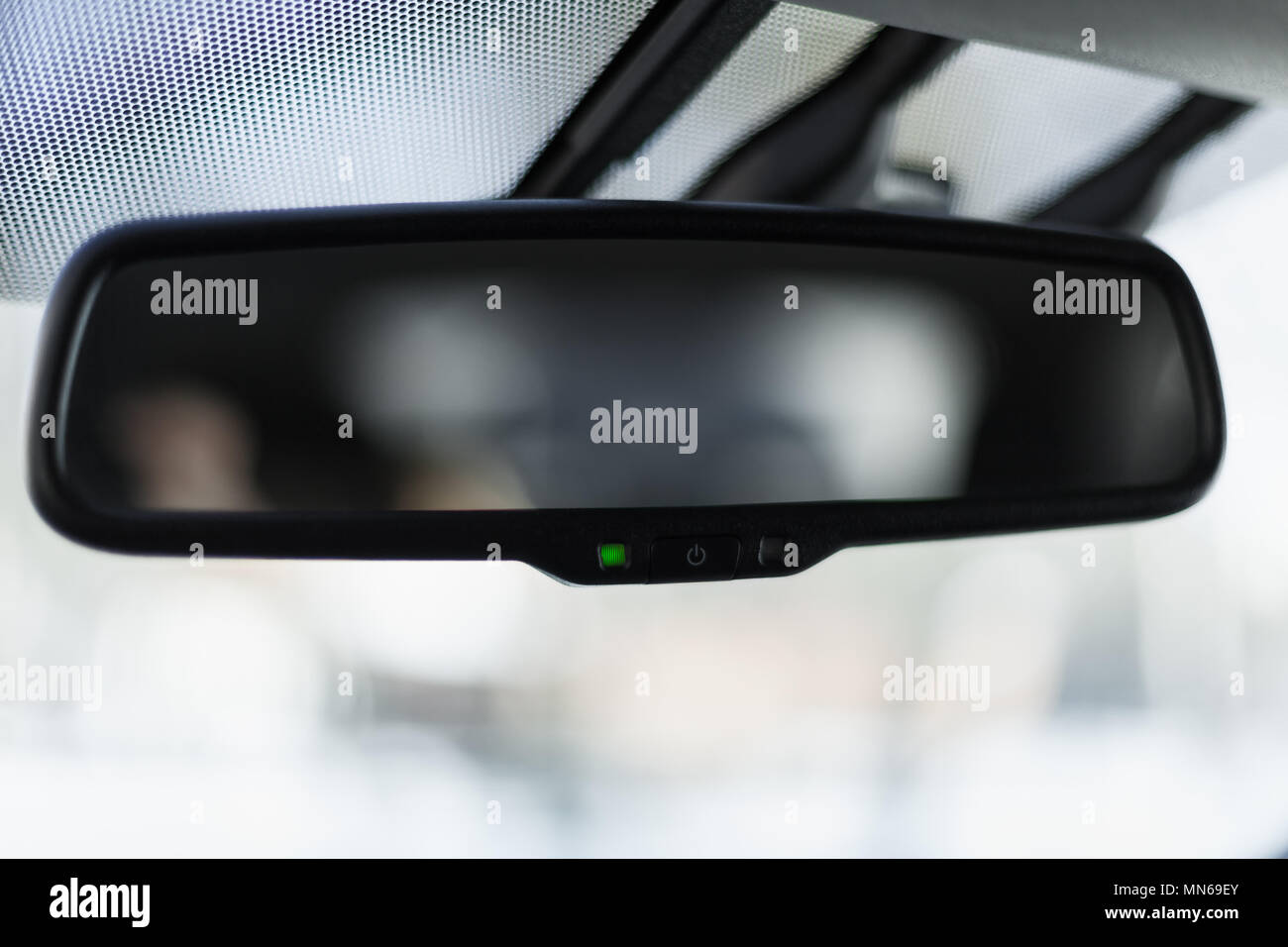 Car mirror with adaptive dimming system, auto brightness control Stock Photo