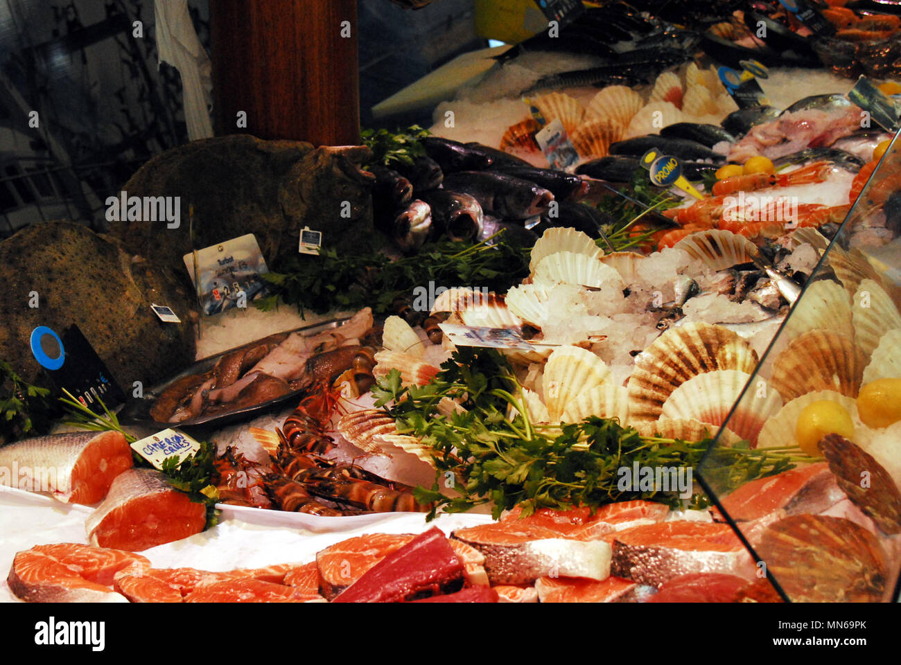 Delectable display of a variety of fresh seafood at a market in France. Stock Photo
