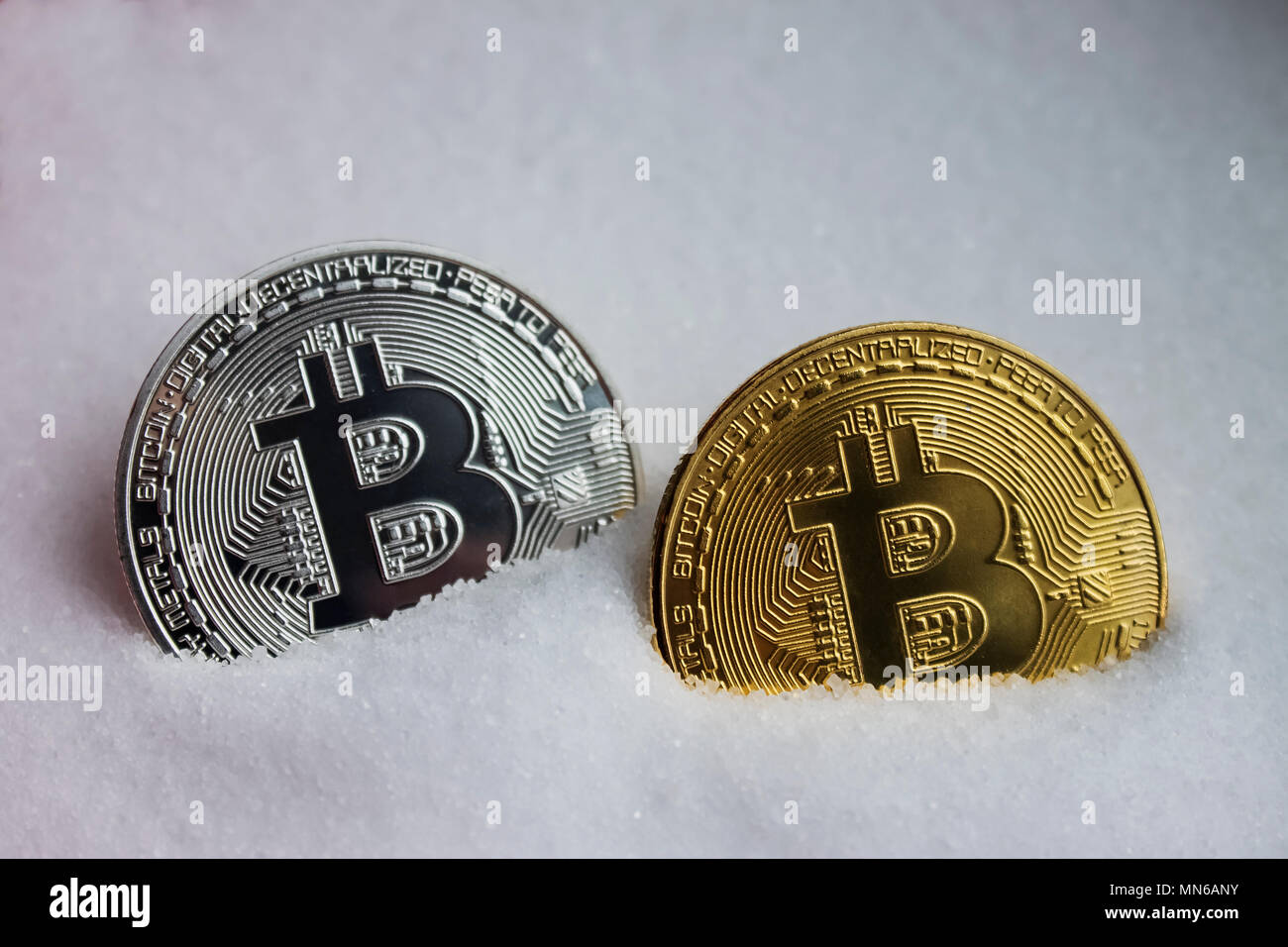 Golden bitcoins, silver dash and dollar notes on newspaper Stock Photo -  Alamy