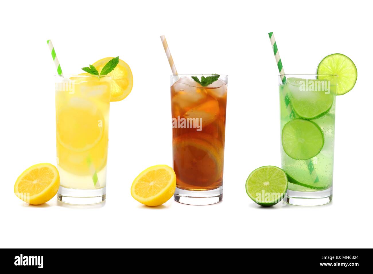 Three glasses of summer lemonade, iced tea, and limeade drinks with straws isolated on a white background Stock Photo