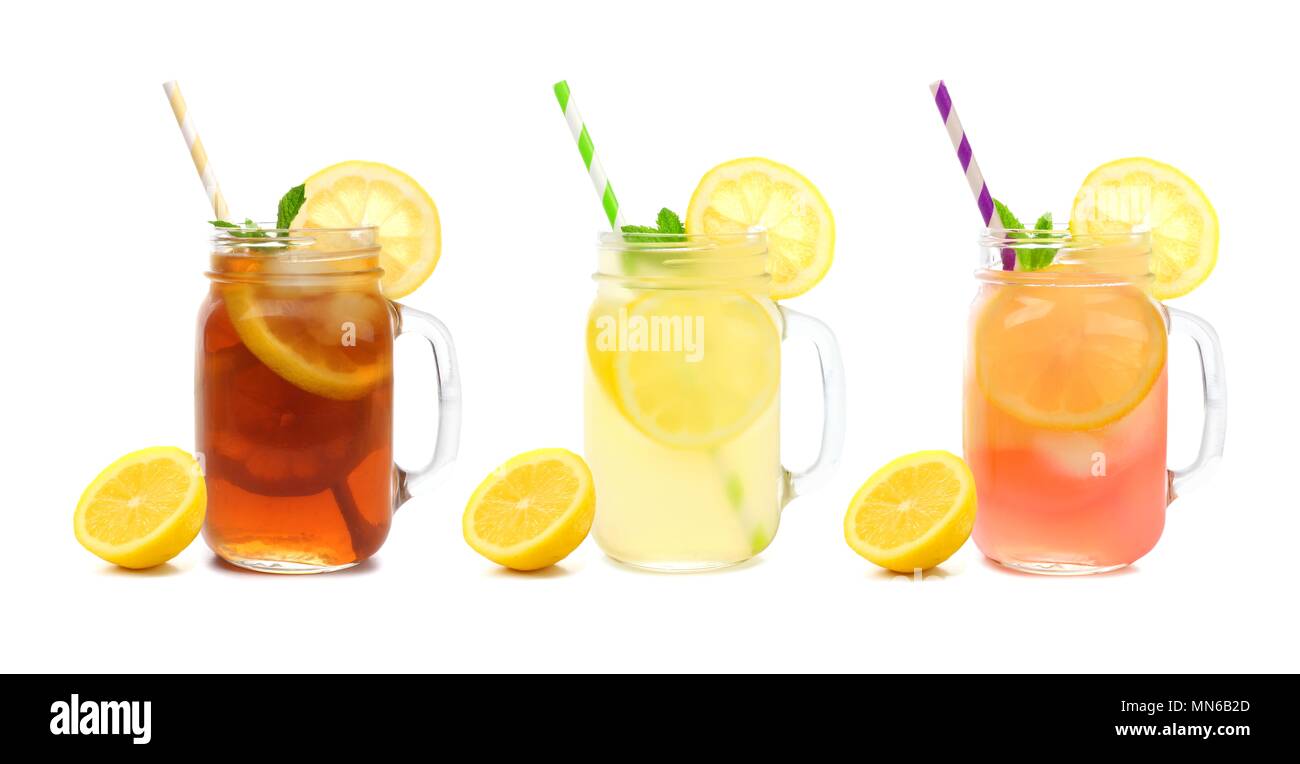 Three mason jar glasses of summer iced tea, lemonade, and pink lemonade drinks isolated on a white background Stock Photo
