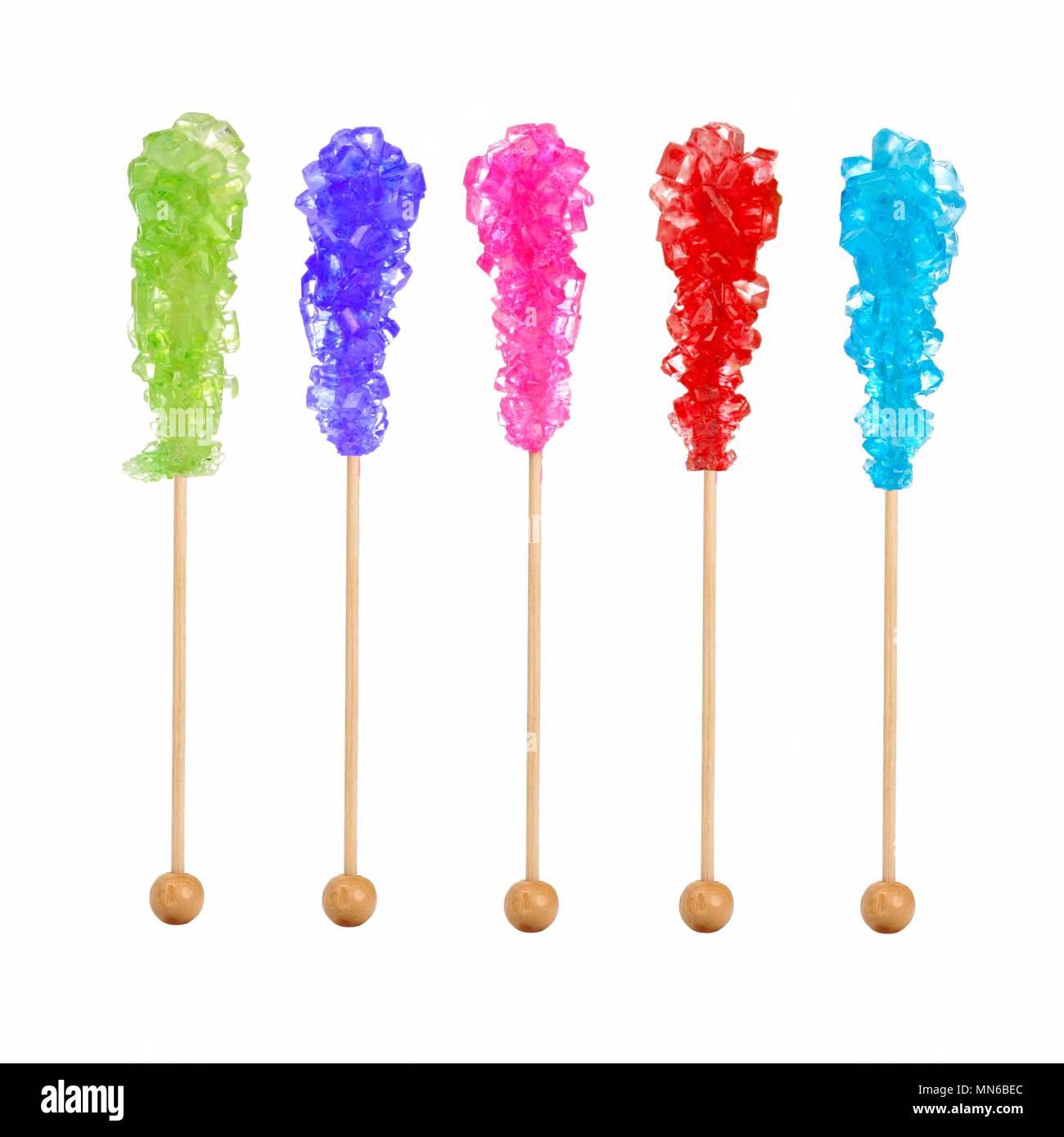 Rock candy in a variety of colors isolated on a white background Stock Photo