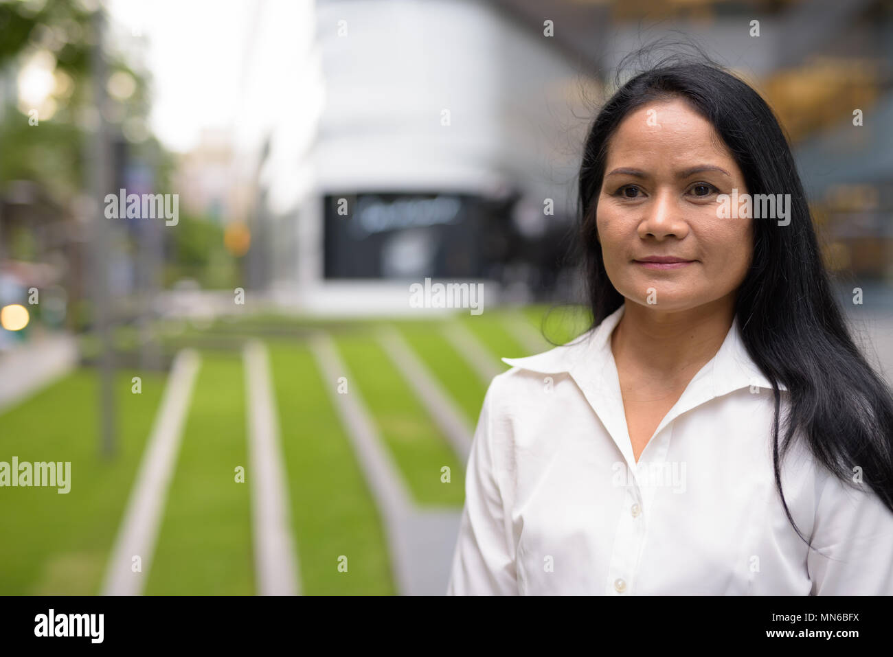 Beautiful mature asian woman hi-res stock photography and images - Alamy