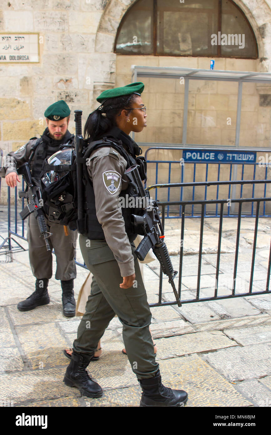 12 May 2018 Young Israeli policeman and woman  on duty in the Via Dolorosa just before the 70 year Independence celebrations. Stock Photo