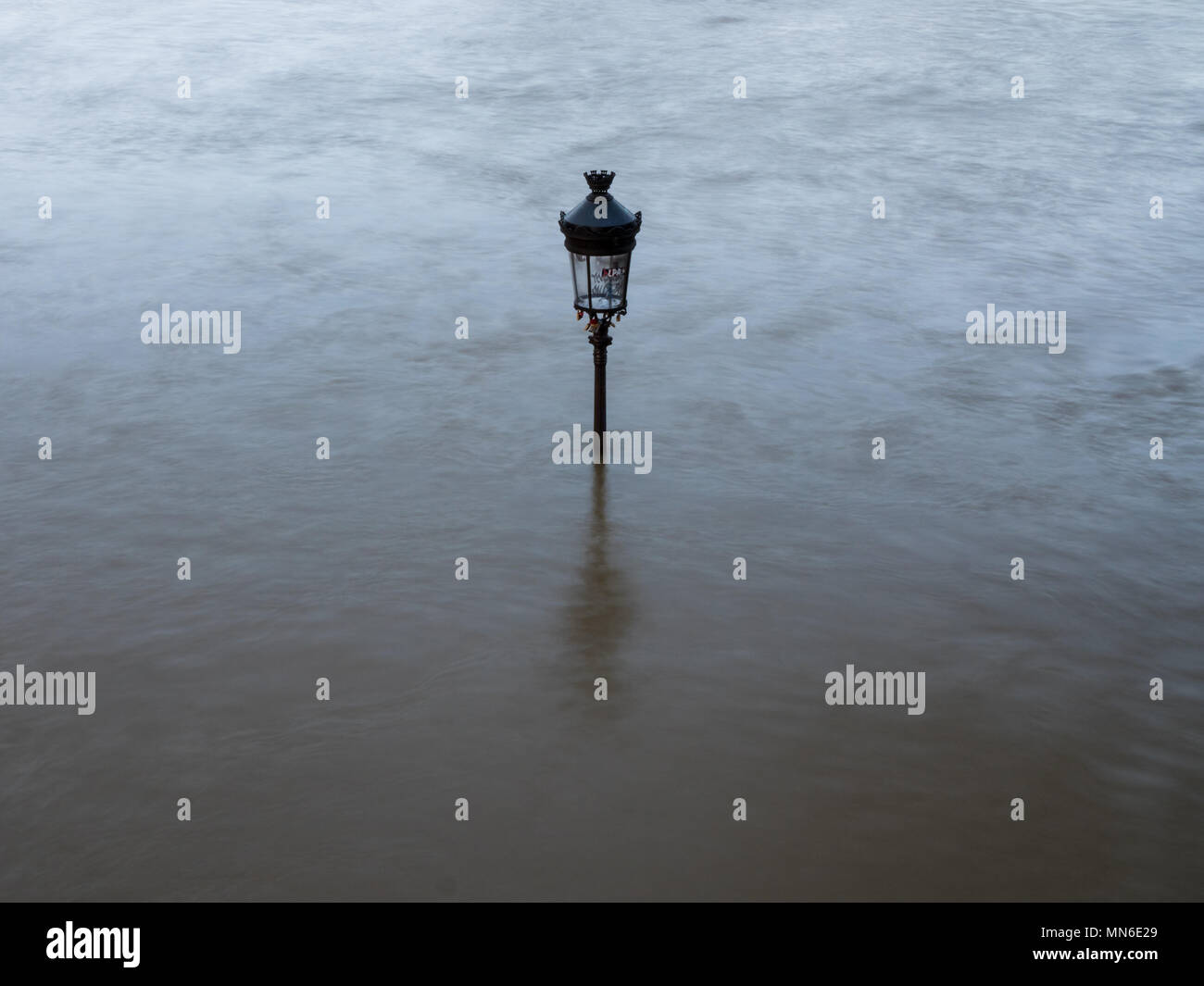 Lamp post under water Stock Photo
